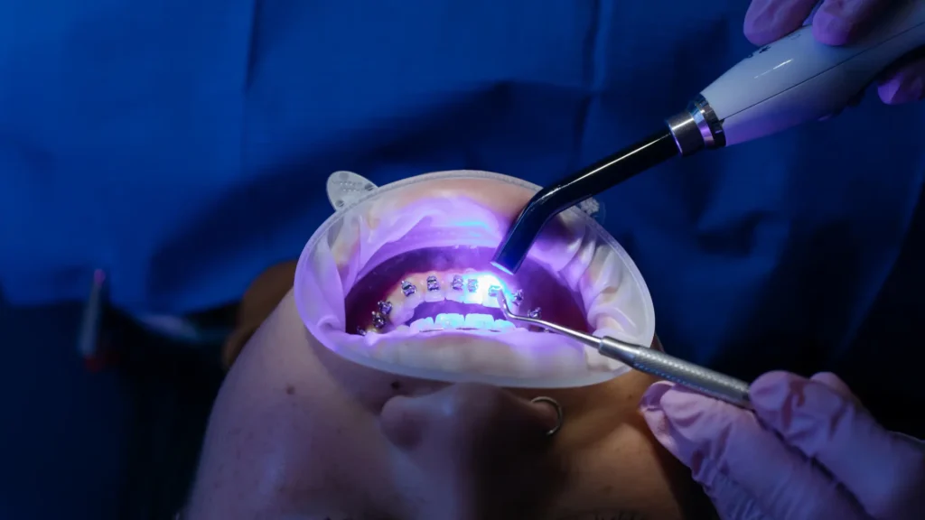 Patient receiving dental treatment with specialized equipment